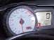 2002 Buell Lightning w/Fairing - A motorcycle's interior dashboard displays a tachometer and a digital screen with mileage and status indicators.