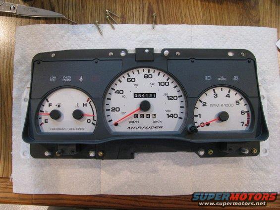 img_6787.jpg Several hex screws hold the clear plastic lense in place. This is a good time to use a plastic polish to clean this lense. 

Also, it''s a good time to remove any dust and debris normally not accessable and use detail spray to clean the gauges. I used interior detail gel to give the surrounds mat grey surfaces a cleaner, satin appearance. 