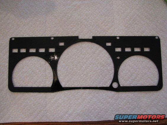 img_6790.jpg The custom guage cluster trim panel, painted the same OEM black as the Marauder's exterior. 