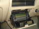 2005 Ford F-250 - A Kenwood FM dual bander transceiver is installed in the dashboard of a vehicle.