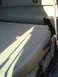 2005 Ford F-250 - The rear seat of a vehicle is shown in this interior shot.