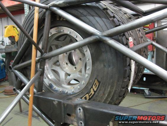Spare tire mounted within a custom roll cage