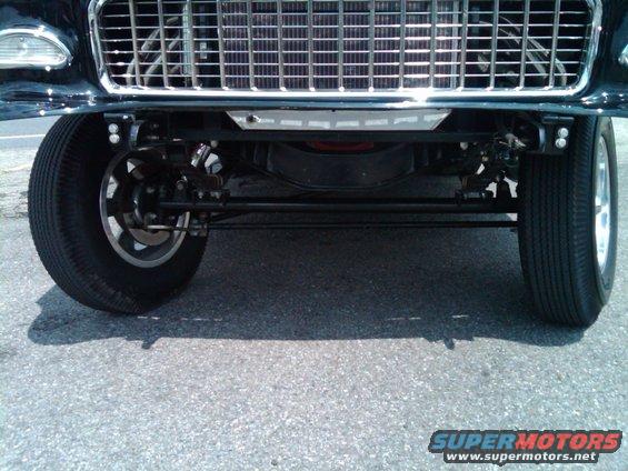 Front view of a 1955 Chevrolet Bel Air showing the grille and front suspension