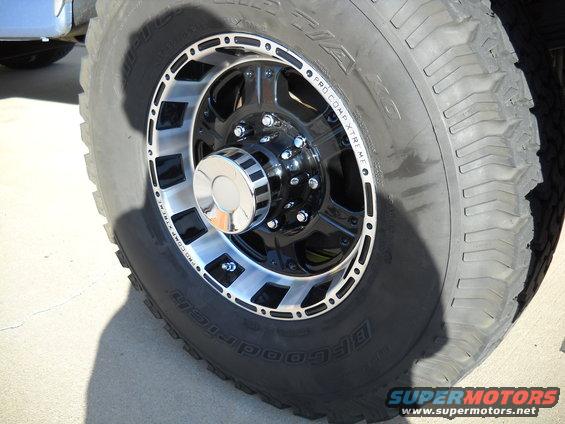Truck wheel with black and chrome rim, BFGoodrich tire, and chrome center cap