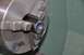 1996 Ford Bronco - Machining a threaded component held in a lathe chuck.