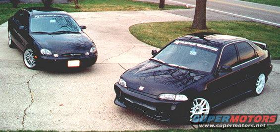 1999 Ford Taurus parked on driveway, 3q-front view