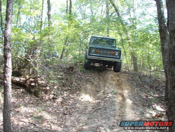 09082701gate.jpg The 3rd day of practice began with a trail I opened Sunday.  At the foot of this hill is a VERY tight gate between 2 trees, followed by a VERY sharp (3-point minimum) turn, and then a severe off-camber burm beside a dropoff hidden by rotting branches.