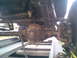 1984 Ford Bronco II - Undercarriage view of a vehicle's suspension and differential assembly.