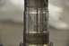 1996 Ford Bronco - This is a close-up view of a metal spindle part, showing signs of wear.