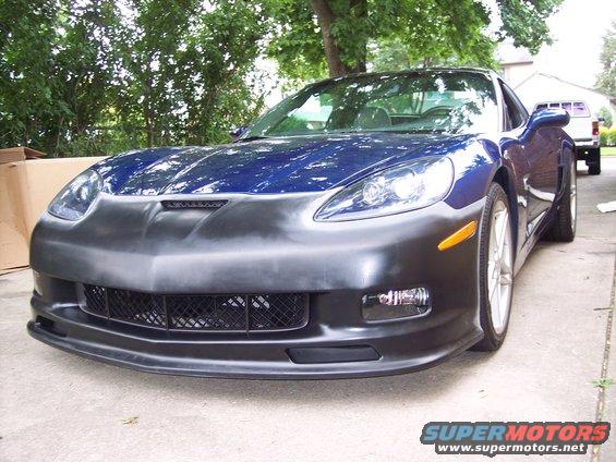Blue 2006 Chevrolet Corvette with unpainted front bumper