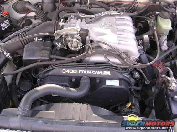 Toyota 3400 Four Cam 24 engine cover with hoses and components