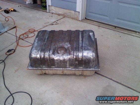 0822091650.jpg All lose metal and rust removed. Actually had a small pinhole fuel was leaking out of.