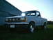 2001 Dodge 2500 - Ford Ranger pickup truck with a chrome grille and aftermarket wheels.