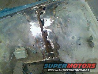 Removed most of the body filler. Was rusted basically in half.