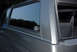 1995 Ford Bronco - A Ford oval sticker is visible on the rear side window of this gray Ford Bronco.
