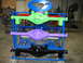 1992 Ford Mustang - Multiple painted rear axle assemblies are displayed on a rolling cart in a workshop setting.