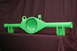 1992 Ford Mustang - A bright green rear axle housing is displayed against a dark fabric background.