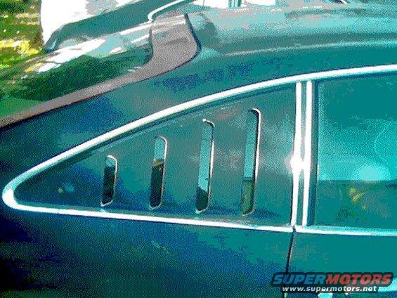 Dark green 1978 Ford Mustang II rear quarter window with louvers