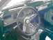 1978 Ford Mustang II - The interior of a 1978 Ford Mustang II, with a focus on the dashboard and steering wheel.