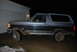 1995 Ford Bronco - This 1995 Ford Bronco is shown from the side, a two-tone gray and black paint scheme.