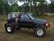 1985 Toyota Pickup/SR5 - Modified 1985 Toyota Pickup/SR5 with flatbed and off-road tires.