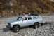 1990 Chevrolet Suburban - This lifted 1990 Chevrolet Suburban is equipped for off-road adventure with a roof rack carrying extra gear and a spare tire.