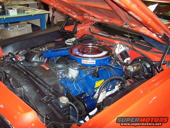 100_3034.jpg I tried to preserve the look of the engine compartment, so no chrome; this is the original 4 barrel air cleaner.