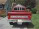 1979 Ford F-150 - Rear view of a red 1979 Ford F-150 pickup truck parked in a driveway.