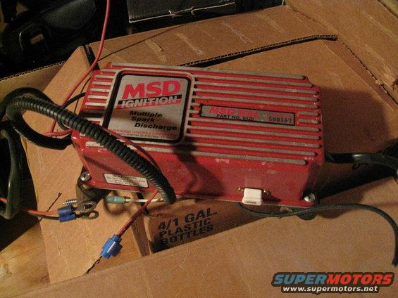 Red MSD Ignition box with "Multiple Spark Discharge" label, part number 6420, serial number 500187. Wires and connectors attached