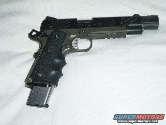 Springfield Armory pistol with extended magazine