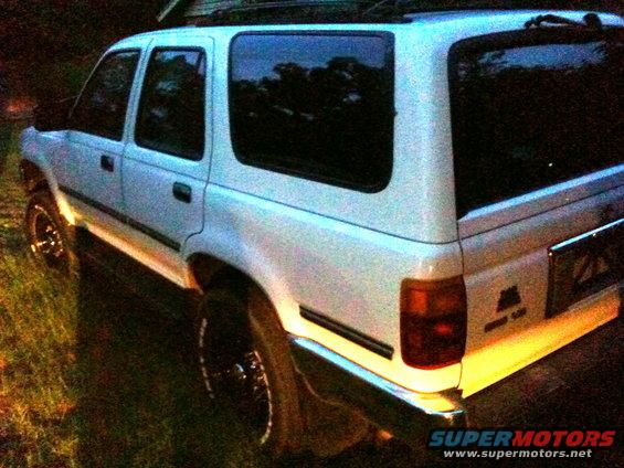 1993 Toyota 4Runner rear quarter view, parked on grass at dusk