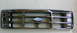 1979 Ford Bronco - A black Ford grille with horizontal bars and a central blue Ford emblem is shown.