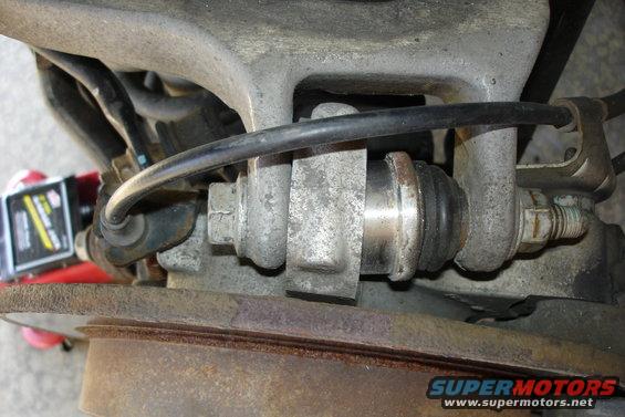 91209-001.jpg New knuckle bushing backing out of knuckle.