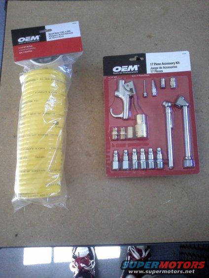 Yellow air hose and a red-packaged 17-piece accessory kit with tire inflator and air gun