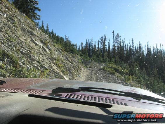 A view out of the windshield at the fun road ahead.  This is only a hint of some of the more difficult parts of the trail.  VERY narrow, rough, rocky, and a thousand feet of canyon on the side of failure.  