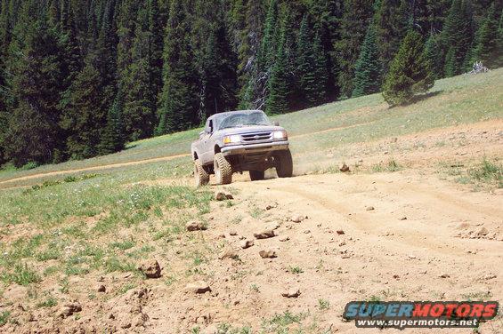 dcp_0159.jpg Brandon McNally on the hill climb to Funny Rocks/Moon Rocks.  <br>(7/14/2002)