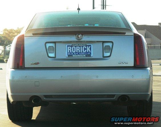 Silver 2006 Cadillac STS rear view with license plate 'RORICK BUICK-CADILLAC RORICK'