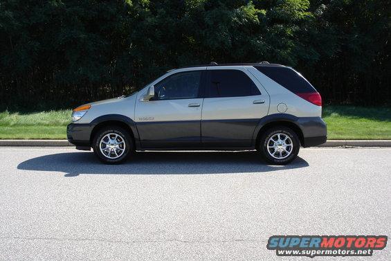 Two-tone beige and dark gray 2002 Buick Rendezvous SUV, side view