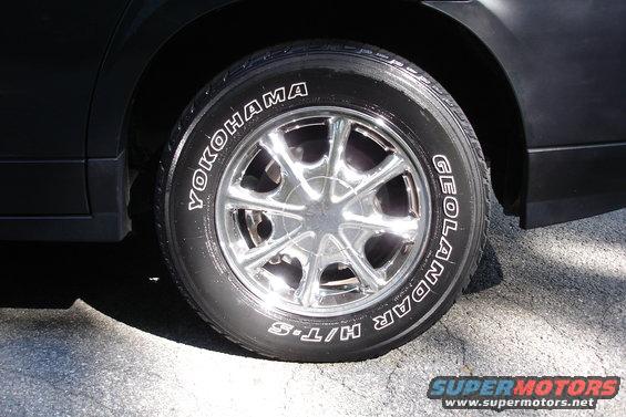 Close-up of a Yokohama Geolandar H/T-S tire on a chrome wheel