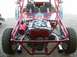 1993 Ford Taurus - Rear view of a custom dune buggy, highlighting its exposed engine and roll cage construction.
