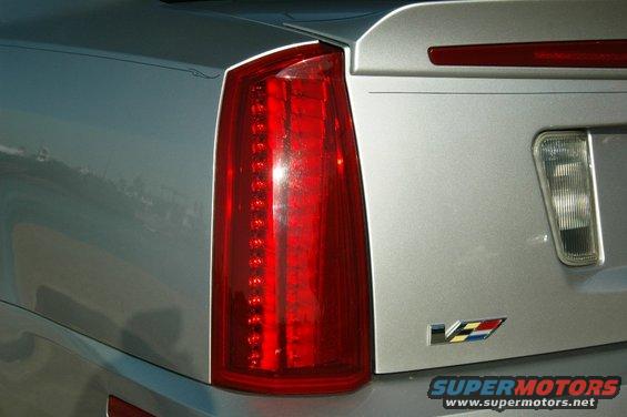 Silver Cadillac STS V-Series rear quarter panel with taillight and V badge