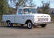 1984 Ford Bronco - This classic Ford pickup truck features a distinctive grille and a "FOR SALE" sign visible through the windshield.
