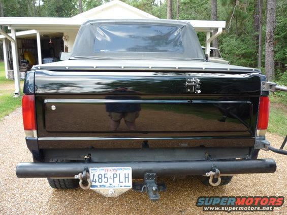 1990 Ford Bronco rear view with soft top and aftermarket bumper