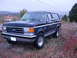 1989 Ford Bronco - This 1989 Ford Bronco features a dark blue exterior with silver trim and is shown in a natural, outdoor environment.