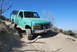 1996 Ford Bronco - This 1996 Ford Bronco is navigating a steep dirt path on a sunny day.