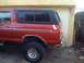 1978 Ford Bronco - This 1978 Ford Bronco is seen from the side, its distinctive red paint and black hardtop.