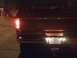 1978 Ford Bronco - The rear of a 1978 Ford Bronco is visible, a California license plate and Ford emblem.