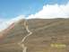 1994 Ford Bronco - Vehicles ascend a switchback dirt road on a mountain slope, with a date stamp of 08/30/2009.
