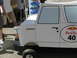 1986 Ford Bronco - A custom-built soap box car designed to resemble a vehicle, complete with branding and a model name.