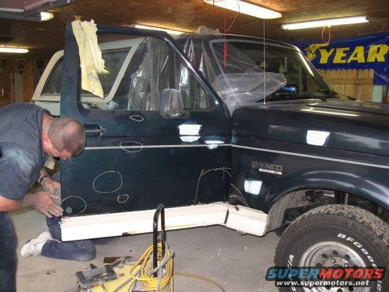 bronco-035.jpg my dad checking the dents out on the door
